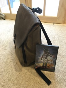 Filled with stuff. DVD for scale